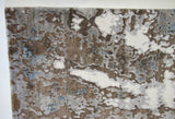Blue and Taupe Abstract Area Rug