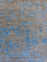 Beige and Turquoise Abstract Area Rug