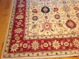 Traditional Rug with Red Border