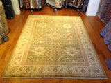 Traditional Pakistani Green and Beige Floral Rug