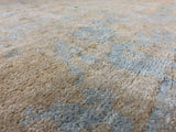 Beige and Turquoise Abstract Area Rug