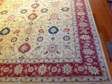 Traditional Rug with Red Border